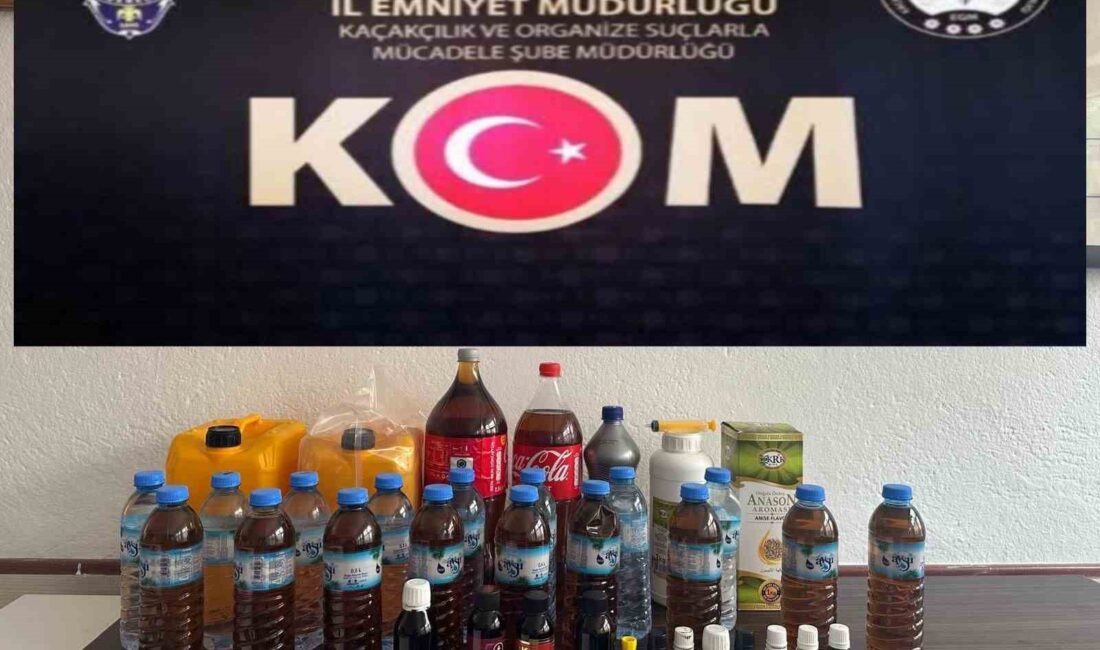 AFYONKARAHİSAR’DA BİR EVE BASKIN DÜZENLEYEN POLİS 21 LİTRE KAÇAK ALKOL