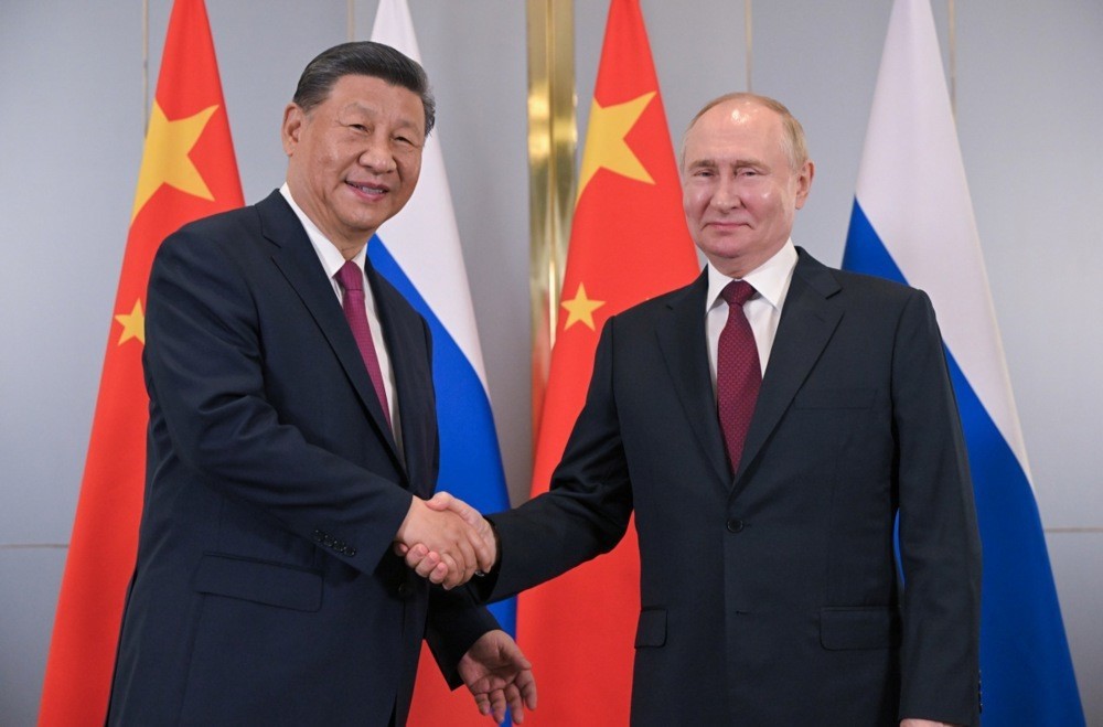 Rusya Devlet Başkanı Vladimir Putin ve Çin Devlet Başkanı Xi