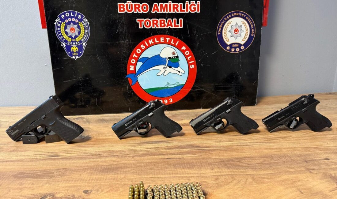 İzmir'in Torbalı ilçesinde, taşıdığı çuvalda ruhsatsız silah ele geçirilen şüpheli