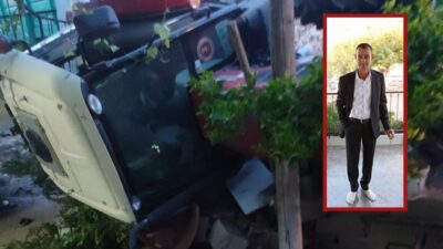  Hatay'da kontrolden çıkarak devrilen saman yüklü traktörün römorkunun altında kalan