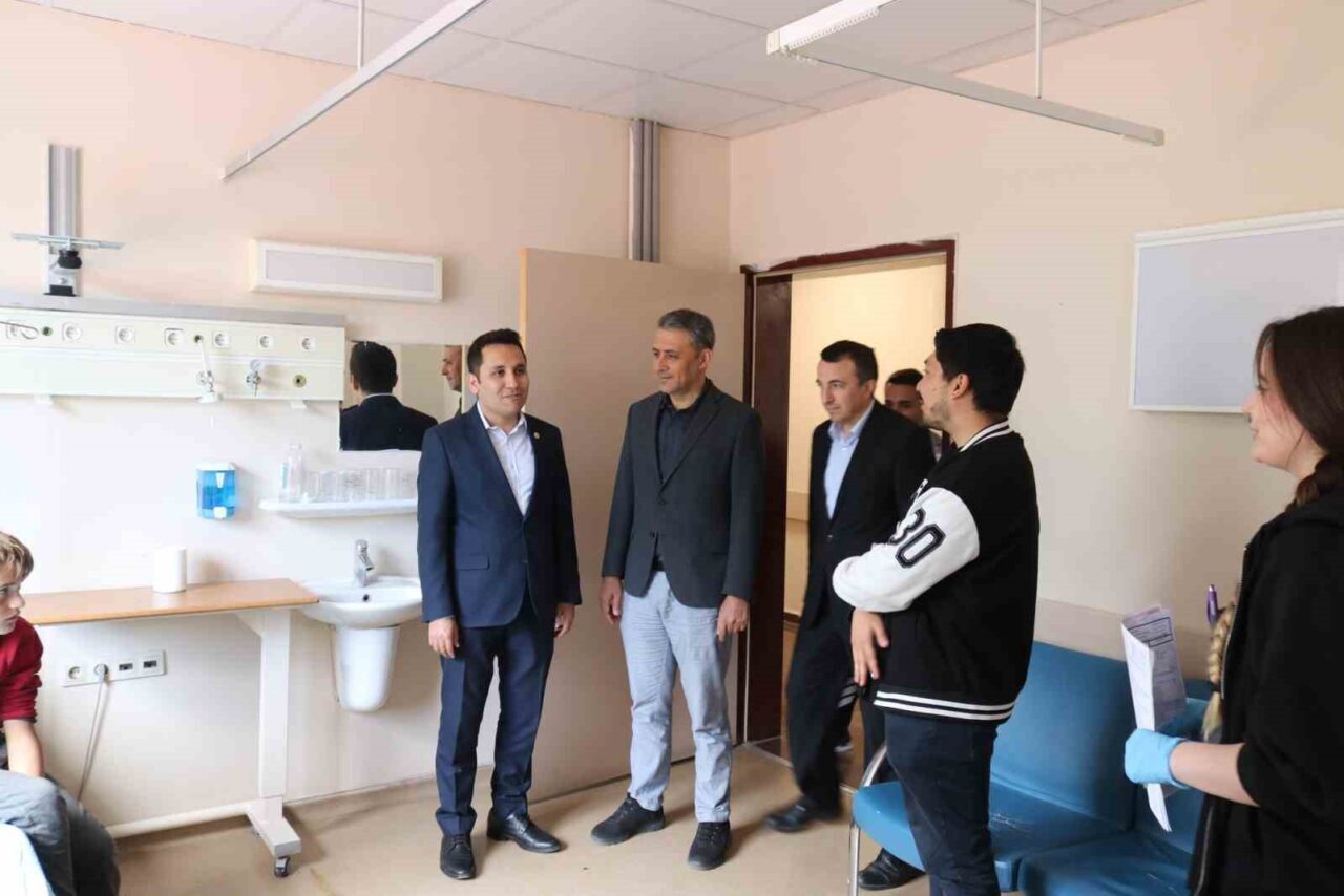 İhsaniye Kaymakamı İsmail Bildirici, İhsaniye Milli Eğitim Müdürü Arif Kavas