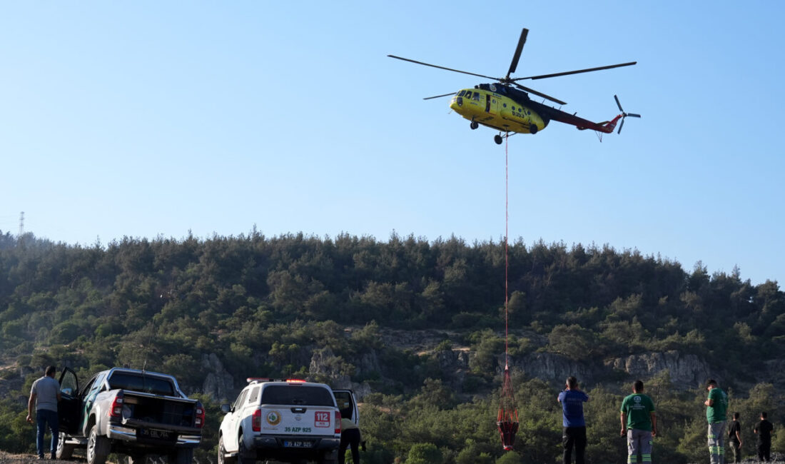 İzmir'in Aliağa ilçesinde başlayarak Foça'ya sıçrayan orman yangınına havadan ve