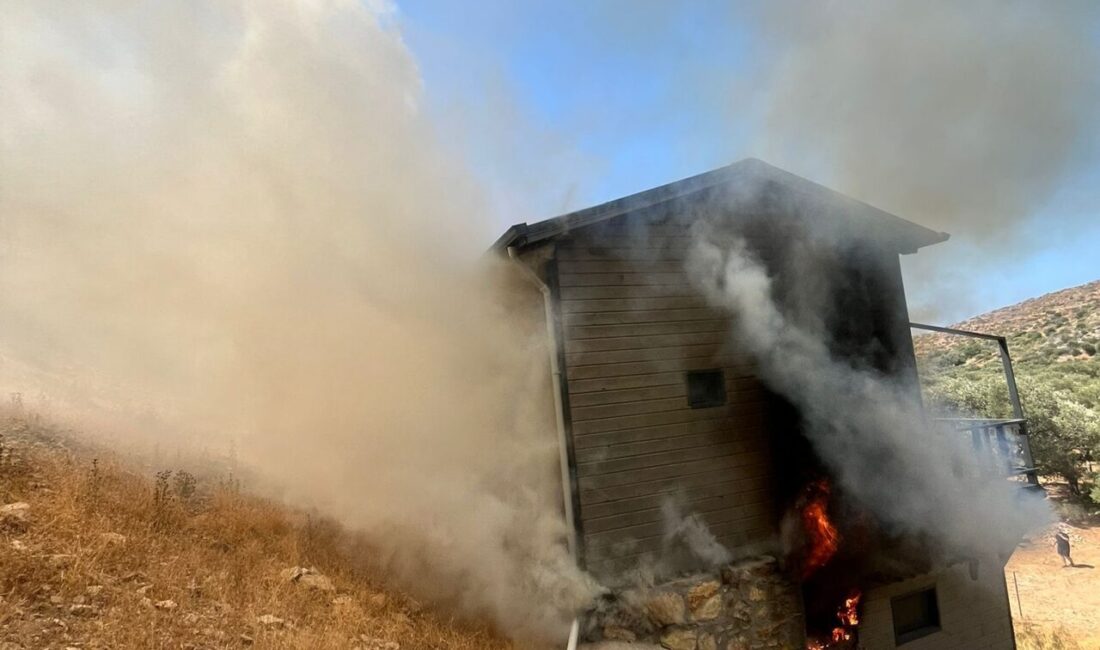 Muğla'nın Bodrum ilçesinde bir evde çıkan yangın, ormanlık alana sıçramadan