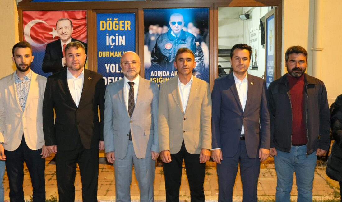 AK Parti Döğer Belde Başkanlığında düzenlenen törende partiye katılan 54