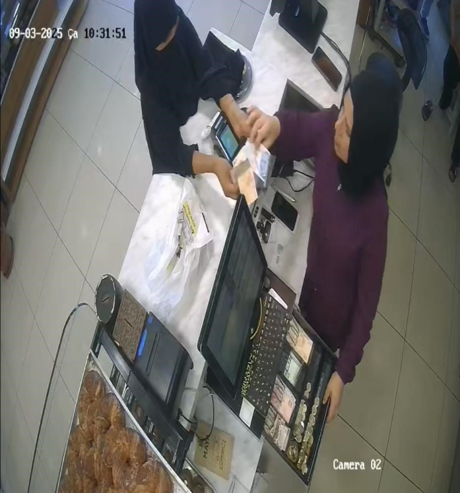 Bursa'nın Yıldırım ilçesinde, "tırnakçılık" yöntemiyle dolandırıcılık yapmaya çalıştıkları iddia edilen