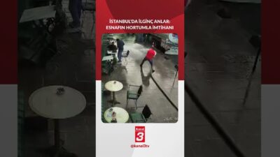 İstanbul’da dükkan önünü tazyikli suyla yıkamaya çalışan esnaf, hortumun kontrolünü