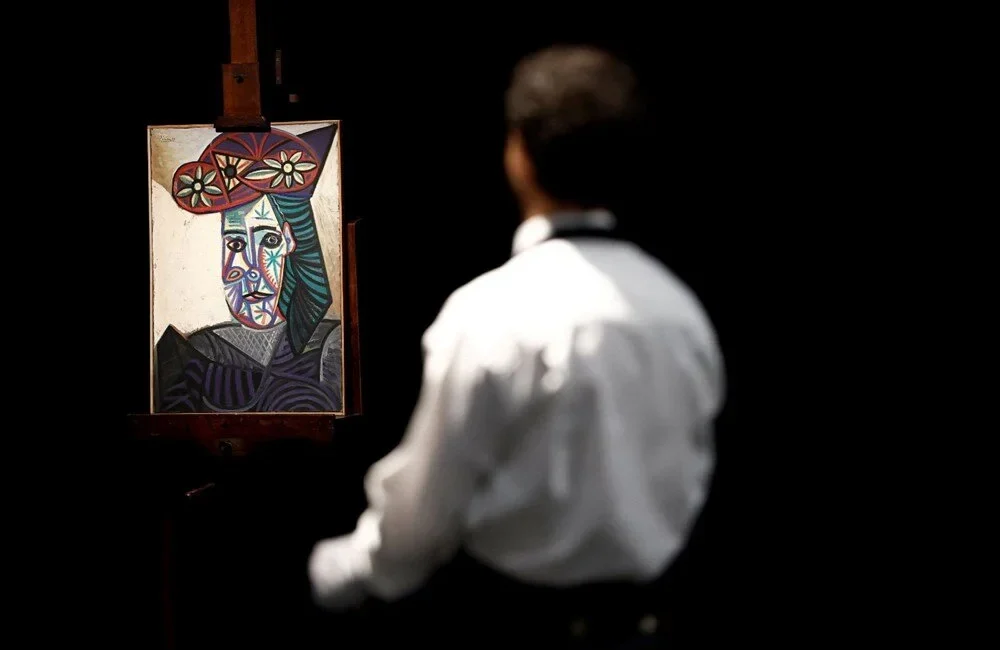 Picasso’nun gizemli tablosu rekor fiyata satıldı Dünyaca ünlü İspanyol ressam Pablo Picasso'nun 1943 yılında çizdiği ve