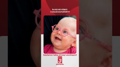 Bir bebek, ilk kez gözlük taktıktan sonra dünyayı bambaşka bir