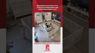 Bir babanın rahat rahat oyun oynamak için bebeklerine karşı aldığı