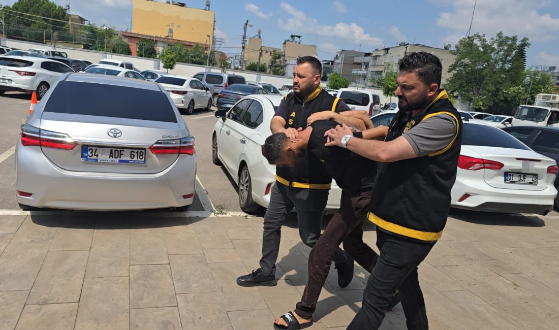 Adana'da çarşaf giyip yüzlerini gizleyen erkek şüpheli ile yanındaki kadın,