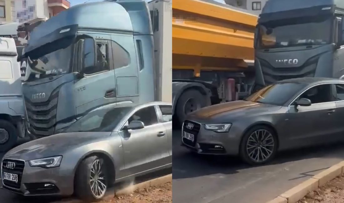 Mersin'de tırın çarptığı otomobil sürücüsü, aracında inerek tırın camını kırdı.
