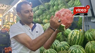 Kütahya'nın Emet ilçesinde manavlık yapan Salih Aydoğdu'nun, sattığı karpuzun doğallığını