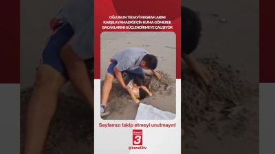Oğlunun tedavi masraflarını karşılayamadığı için kuma gömerek bacaklarını güçlendirmeye çalışıyor…