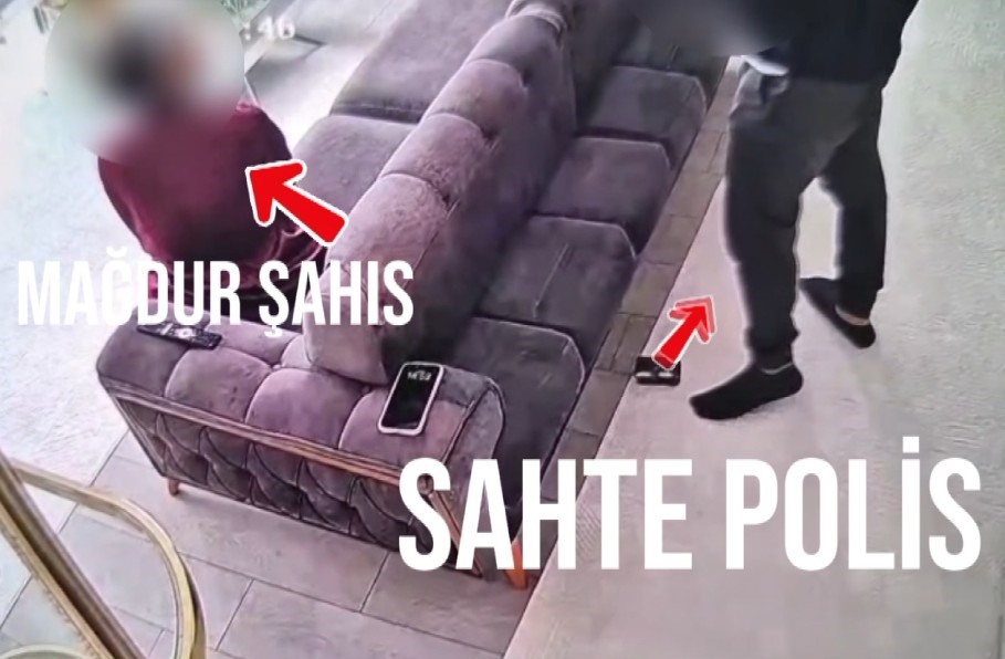 Antalya'nın Aksu ilçesinde bir kişinin evine giderek kendisini polis olarak